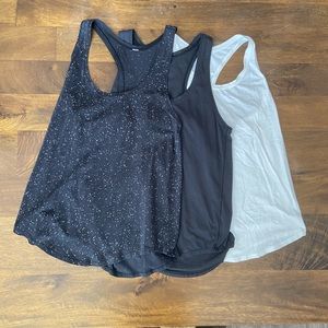 3 size 4 Lululemon tanks!
